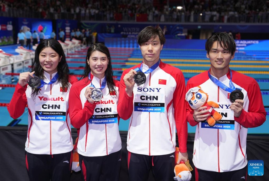 (From left) Team China's Wu Qingfeng, Zhang Yufei, Qin Haiyang and Xu Jiayu won silver in the mixed 4x100m medley relay at the World Aquatics Championships in Singapore on Wednesday, July 30, 2025. (Photo: Xinhua/China Daily)